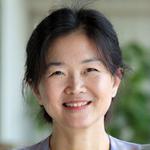 Sarah Chen, a serene mindfulness coach with a calming presence.